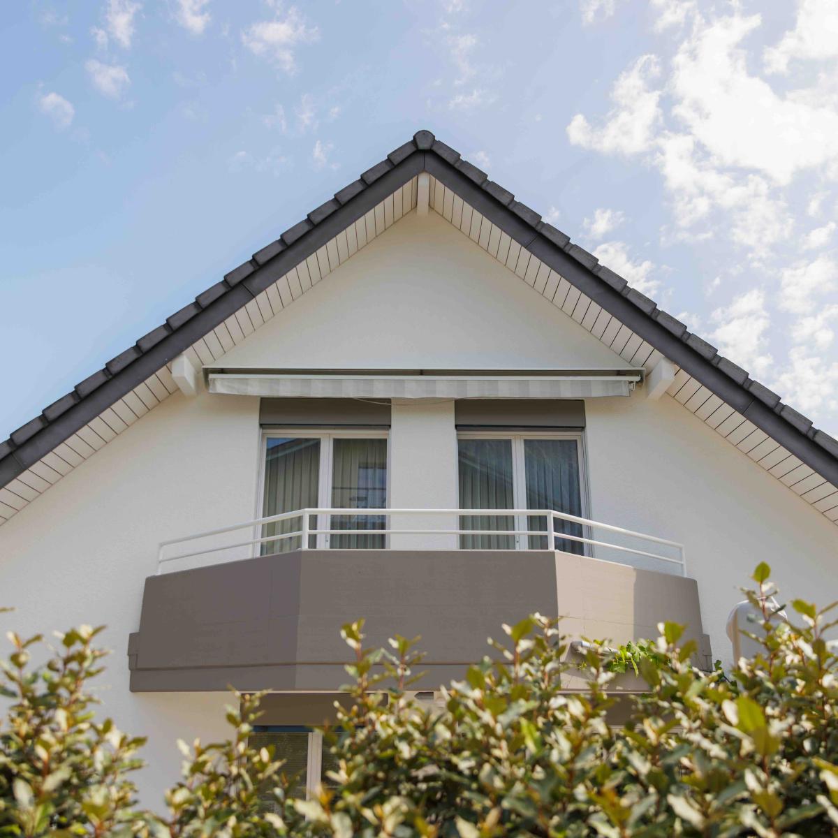 Fassadenrenovation und Balkongestaltung in Spiez